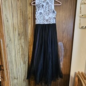 Size 16 young women dress. Brand is Speechle Black bottom tule layers of skirt.